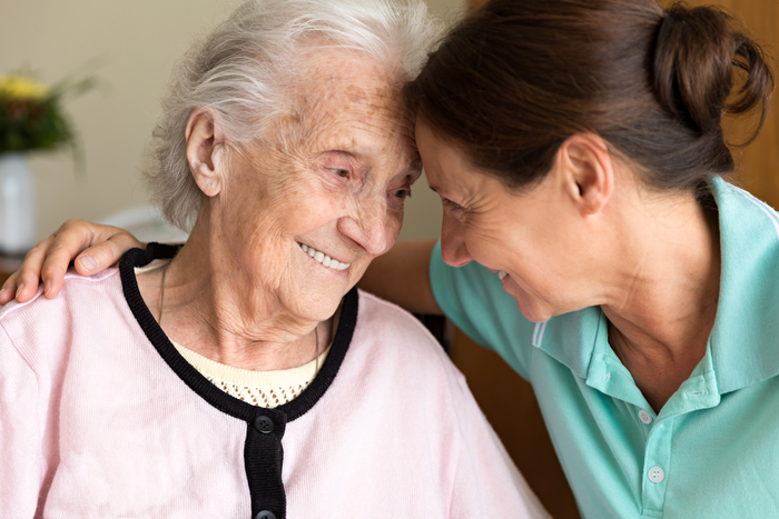 Dementia and Occupational Therapy - Home caregiver and senior adult woman Dementia and Occupational Therapy - Home caregiver and senior adult woman